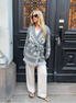 Grey merino wool wrap cardigan with Selbu rose motif and fringed shawl collar