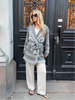 Grey merino wool wrap cardigan with Selbu rose motif and fringed shawl collar