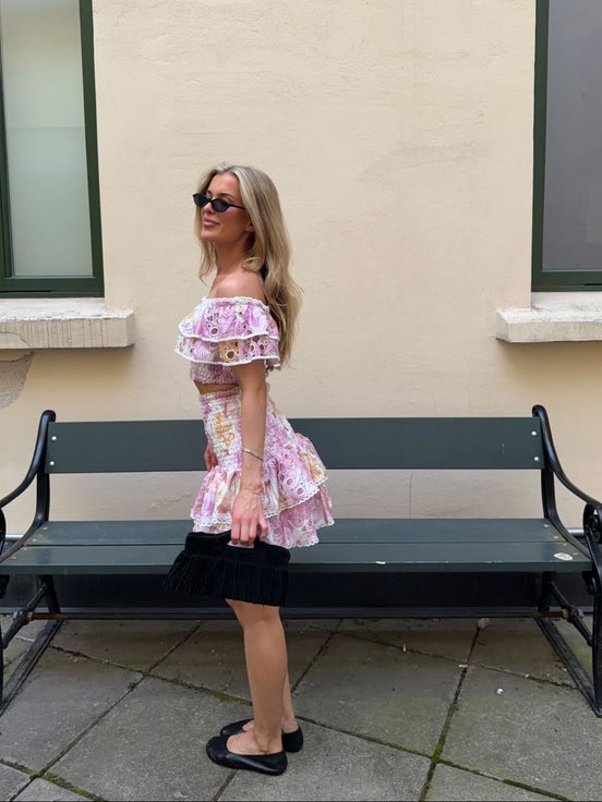 Pink floral broderie anglaise tiered mini skirt with ruffles and smocked waist