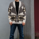 Men's grey and beige merino wool cardigan with geometric Nordic knit and fringed shawl collar