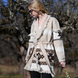 Sand merino wool wrap cardigan with bold geometric Nordic knit and fringed shawl collar