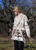 Sand merino wool wrap cardigan with bold geometric Nordic knit and fringed shawl collar