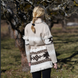 Sand merino wool wrap cardigan with bold geometric Nordic knit and fringed shawl collar