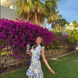 Blue floral broderie anglaise mini dress with ruffled cap sleeves and scalloped hem